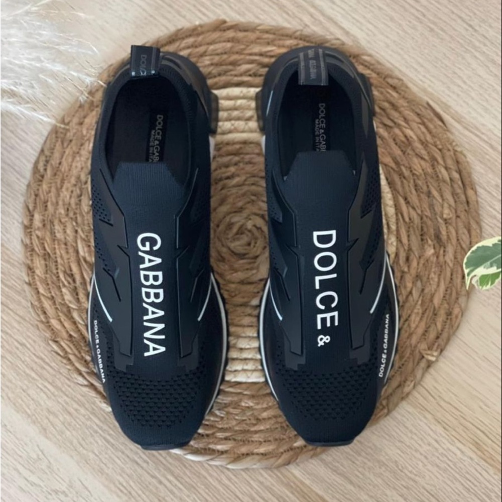 Dolce & Gabbana Black Sneakers.They best fit size 7.5 or 8.